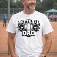 Man wearing a 'SOFTBALL DAD' t-shirt on a baseball field